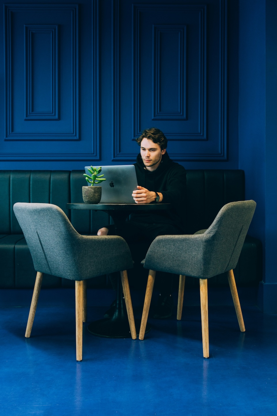 Noah Twilley, back-end developer at Series5, working at his desk